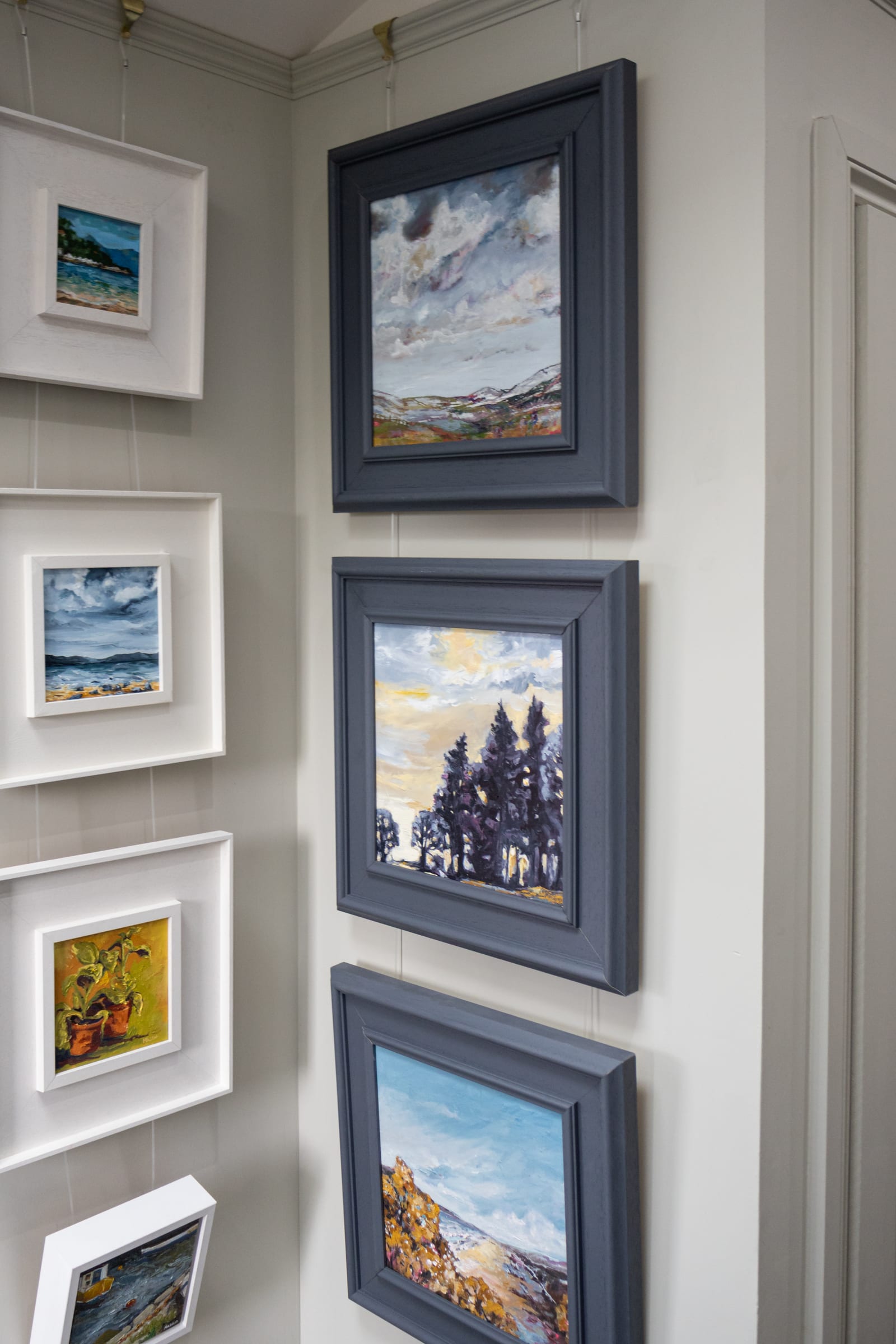 Virginia Maggio’s artwork displayed inside her home gallery